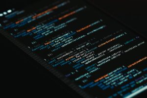 A detailed view of computer programming code on a screen, showcasing software development.